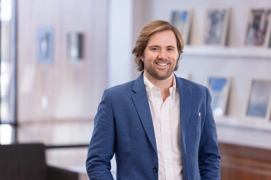portrait of a smiling person in professional attire